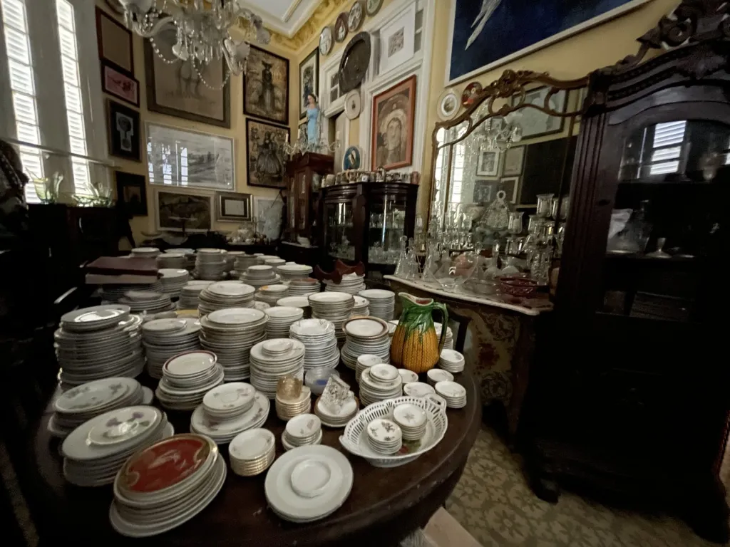 Cuban underground antiques in room filled with dinnerware