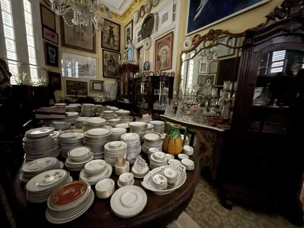 Cuban underground antiques in room filled with dinnerware