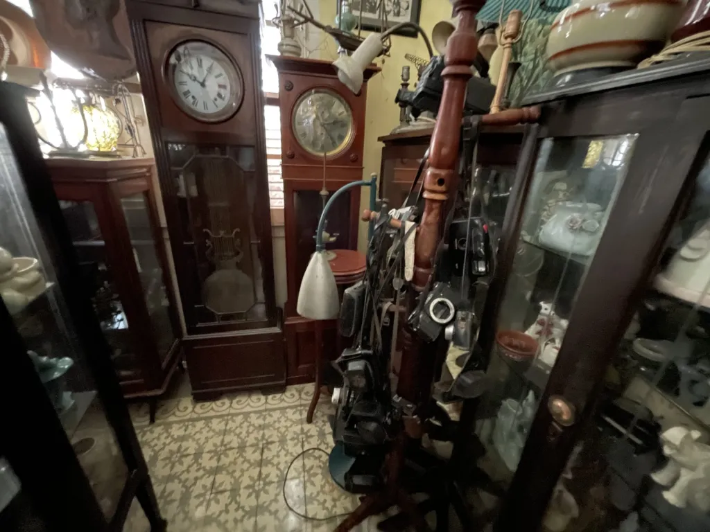 old clocks, cameras and figurines in Cuba