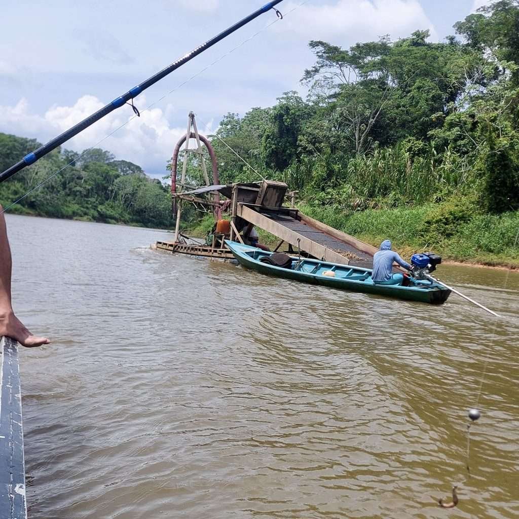 Illegal gold miners on the Heath River between Peru and Bolivia