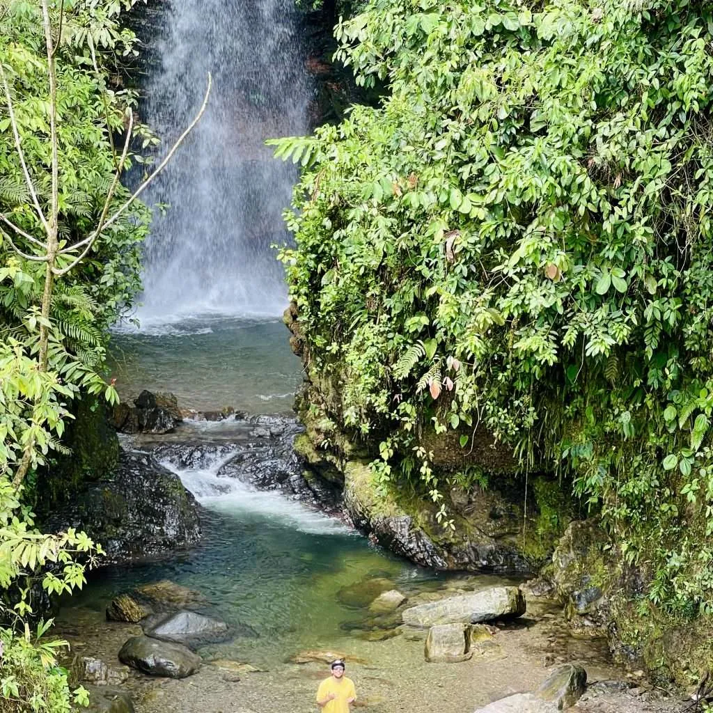 Waterfall on the road trip from Cusco to Puerto Maldonado
