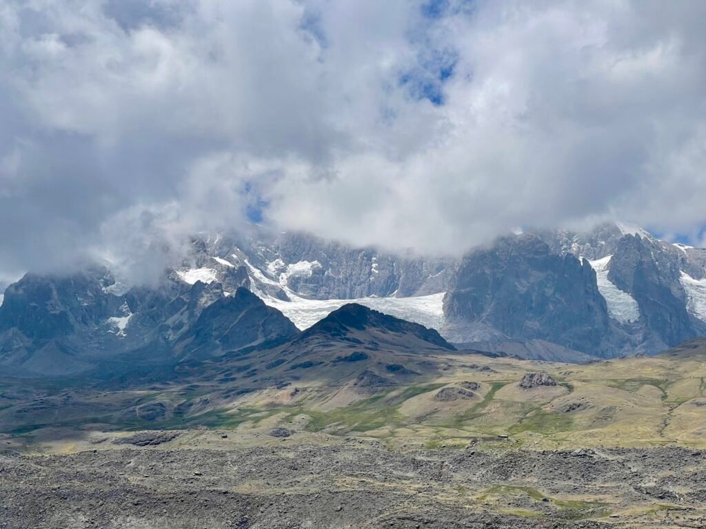 Massive glacier and mountain peaks in the Peruvian Andes, ideal for high-end trekking adventures.