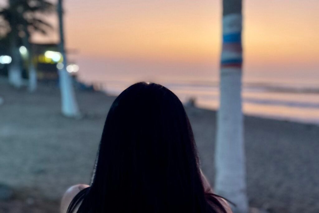 Golden sunset view over the Pacific Ocean from the beach in Huanchaco, Peru.