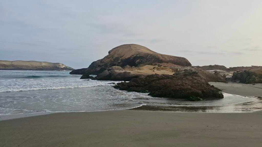 The tranquil and rugged landscape of the coast at Playa Tuquillo, Huarmey.