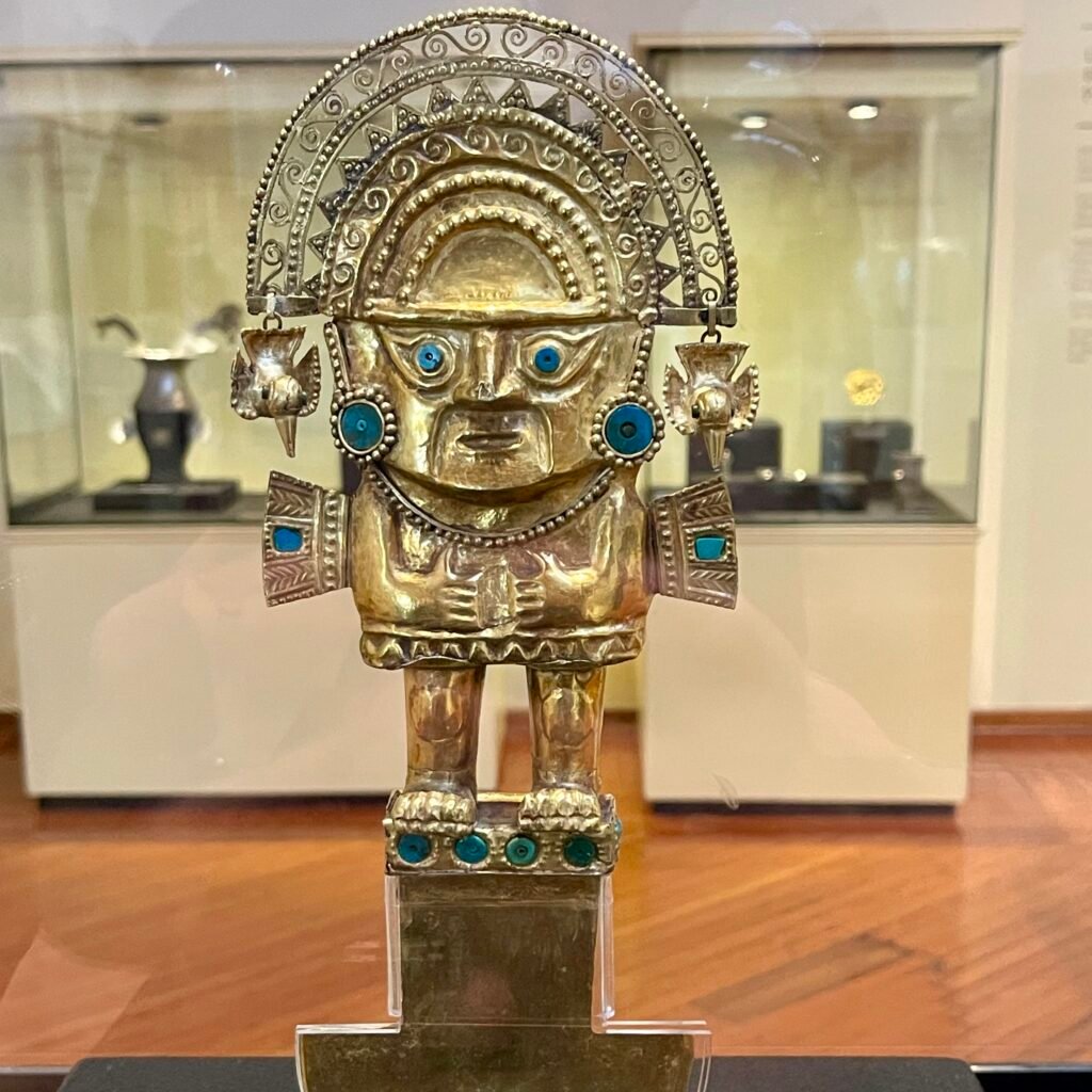 The golden ceremonial Tumi knife with turquoise inlays from the Lambayeque (Sicán) culture, on display at the Larco Museum in Pueblo Libre, Lima.